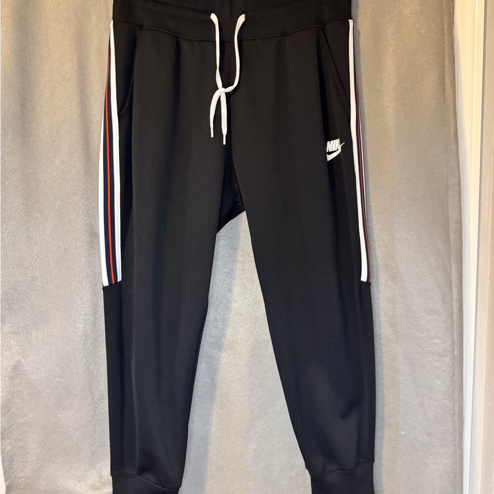 Nike Black Track Pants with White and Red Stripes. Excellent Condition.
